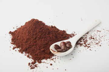 aromatic roasted coffee beans on white background