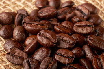 aromatic roasted coffee beans on white background