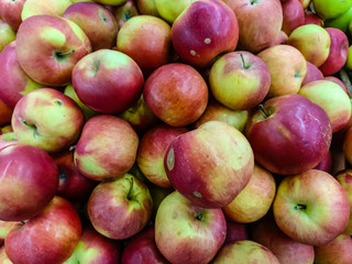 Red apples closeup on the counter for diet and health.