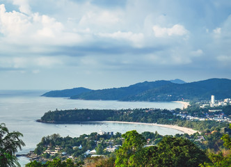 Naklejka premium View of Kata Noi, Kata Yai and Karon Beaches from Karon Viewpoint. Famous Viewpoint in Phuket, Thailand. Picturesque top view to the tropical island with beach, blue sea, mountain, trees and resorts