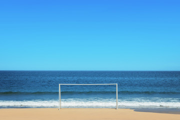 Doors of football games Placed at the beach.