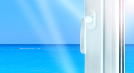 Metal plastic window construction with perfect sea view. Pvc profile iwindow construction.