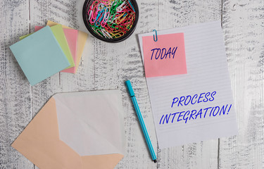Handwriting text writing Process Integration. Conceptual photo Connectivity of Systems Services and Information Envelope sheet paper sticky note pads pen clips holder wooden background