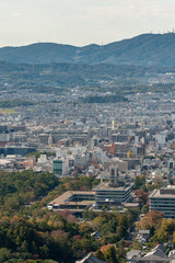 Fototapeta premium Nara city in Japan from the hill in sunny day. Nara city skyline in Japan with a buildings and streets