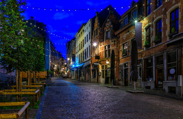 Old street in center of Brussels, Belgium. Night cityscape of Brussels (Bruxelles). Architecture and landmarks of Brussels.