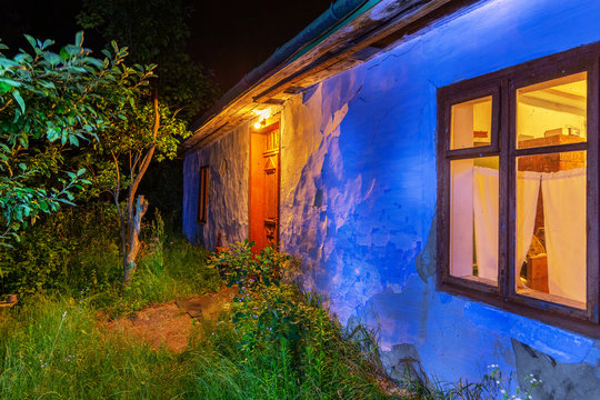 An Old Village House Of Clay At Night