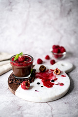 Dark Chocolate Mousse Pudding with Raspberries.
