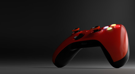 Red video game controller isolated on darkness background	 - obrazy, fototapety, plakaty