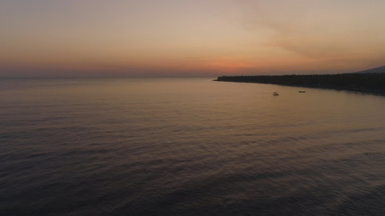aerial view sunrise over ocean. seascape colorful sunrise over sea at tropical resort