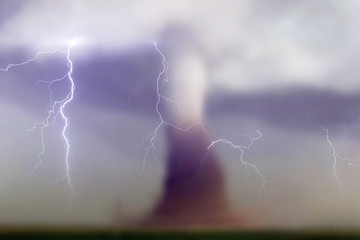 Blurred image of a tornado and rain.