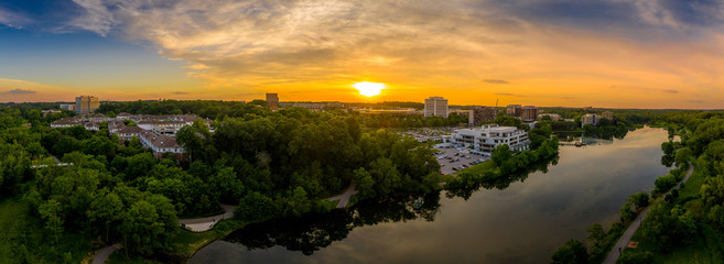 Aerial sunset panorama of Columbia Town Center in Maryland new Washington DC with office buildings...