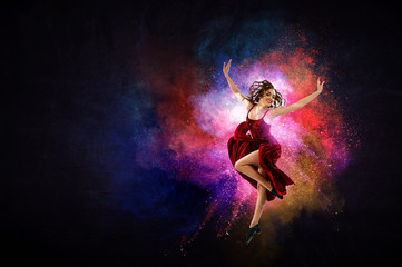 Naklejka na ściany i meble Young and beautiful female dancer in a red dress. Mixed media