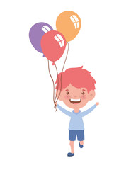 baby boy smiling with helium balloons in hand