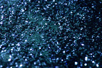 glitter scattered background. brilliance. close-up