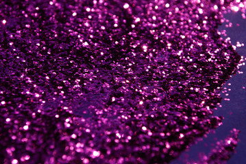 glitter scattered background. brilliance. close-up