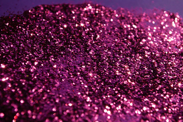 glitter scattered background. brilliance. close-up
