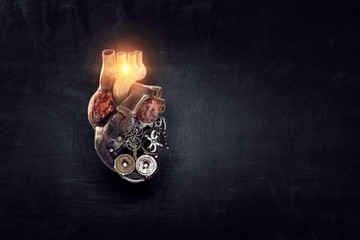 Anatomic heart made with gears and mechanic parts