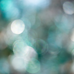 Background made of blue blurred sparkles, copy space