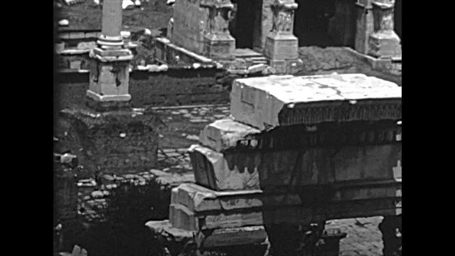 The panoramic aerial view of the Settimio Severo arch and Column of Foca. Roman Forum in Rome city. BW historical archival of Rome capital of Italy in the 1960s.