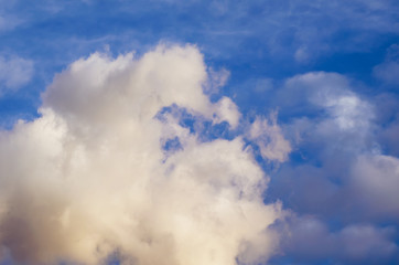 Beautiful stormy cumulus clouds in the sky, background.