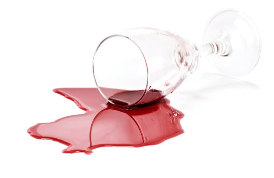 Spilled red wine glass