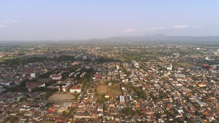 cityscape Yogyakarta with buildings, highway at sunset time. aerial view cultural capital Indonesia yogyakarta located on java island, Indonesia