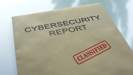 Cybersecurity report classified, seal stamped on folder with important documents