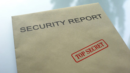 Security report top secret, seal stamped on folder with important documents