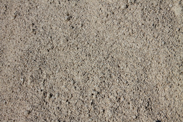 Texture of white granular mixture close-up