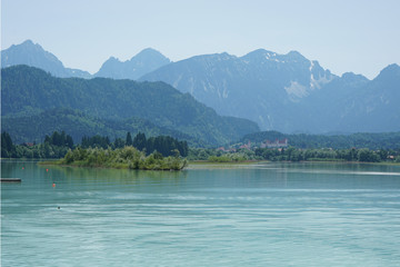 Forggensee is in Bavaria and on the shore Ludwig the Bavarian king built his castle Neuschwanstein
