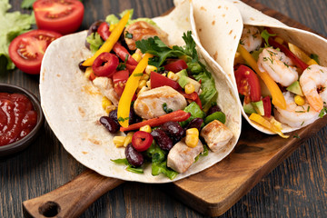 burrito with vegetables and tortilla