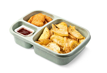 Tasty fried nuggets and potatoes