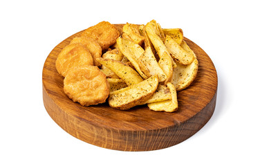 Tasty fried nuggets and potatoes