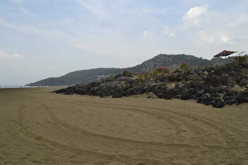 view of the beach, rocks