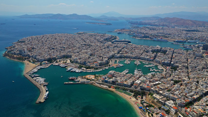 Aerial drone panoramic photo of famous port round port of Mikrolimano and Zea or Passalimani with luxury yachts docked and famous port of Piraeus as seen from great altitude, Piraeus, Attica, Greece