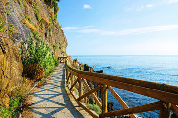 Cinque Terre, Italy. Hiking path along the brilliant blue sea.