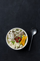 Noodle soup with mushrooms and vegetables