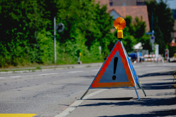 A road cone on the road. road repair work. emergency sign