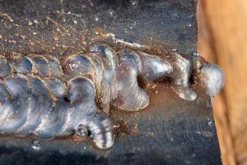 The fillet weld is placed using the MAG method. Errors in steel connections using arc welding.