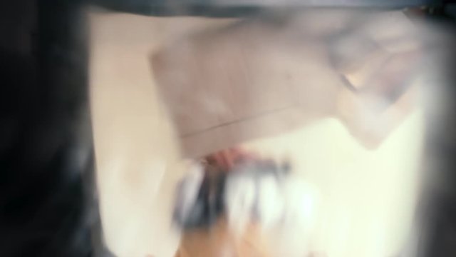 Trash Can Point of View of a Couple hesitating when Recycling Paper and Plastic