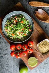 Lebanese Tabbouleh salad with bulgur, parsley, mint, tomatoes and seasoning