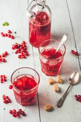 Infused water with red currant and sugar