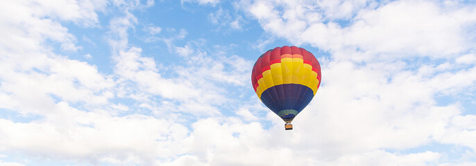 Fototapeta premium Colorful hot air balloon floating under blue sky