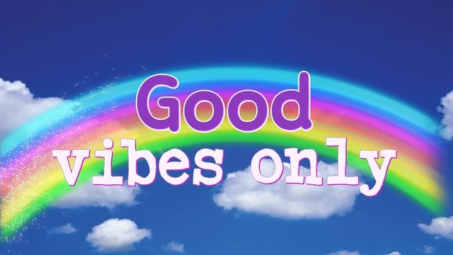 Good Vibes Only sign in a rainbow in the sky