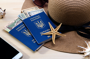 Vacation accessories, documents, ukrainian biometric passports and money. Good for touristic service.