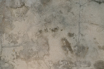 A lot of cracks on an old painted wall. Abstract grunge background