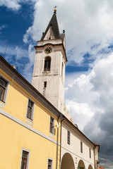 Fototapeta premium Tower of the Church of St. Giles & the Virgin Mary Royal in the old town of Trebon, Czech Republic