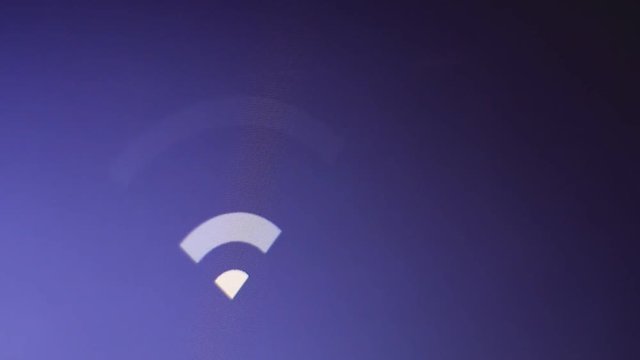 Wifi icon on computer display. Wifi communication data transfer