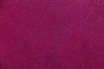 Purple sparkling background, fuchsia colors and all colors of rainbow glitter