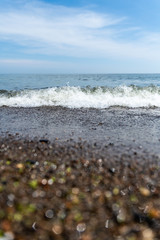 Wave Crashing onto Beach